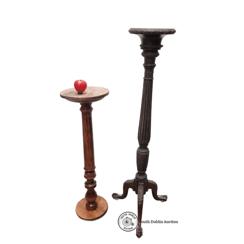 700 - Pair of wooden plant stands, one with intricate carved legs. Approximately 32 inches and 26 inches i... 