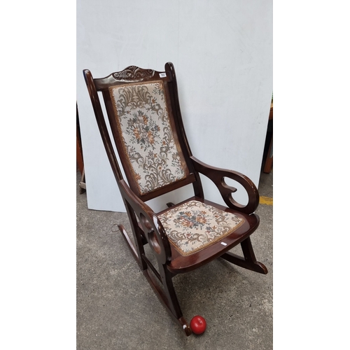 703 - Victorian-style mahogany rocking chair with floral tapestry upholstery. Approximately 100 cm tall, 6... 