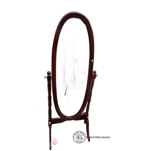 704 - Oval mahogany cheval mirror, Victorian style. Approximately 60 inches tall, 20 inches wide. Freestan... 