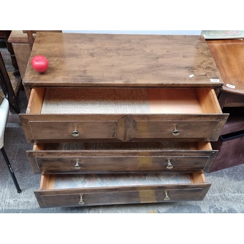 710 - Wooden chest of drawers with three drawers. Approximately 36