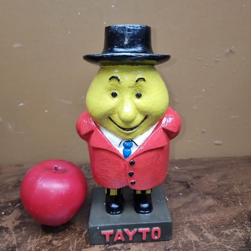 727 - Painted resin statue of the iconic character Mr. Tayto in a red suit. Approximately 20 cm tall.