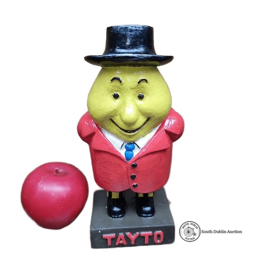 727 - Painted resin statue of the iconic character Mr. Tayto in a red suit. Approximately 20 cm tall.