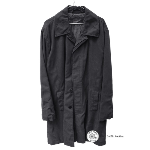 741 - Black trench coat from Butler and Webb, size XL, featuring button closure and two front pockets. In ... 