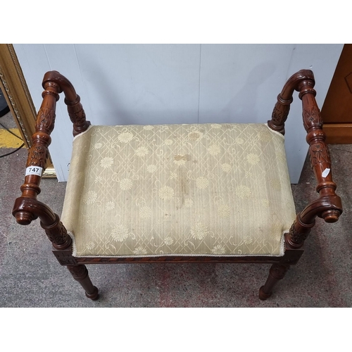 747 - Victorian mahogany carved piano stool, upholstered in cream patterned fabric. Approximately 24 inche... 