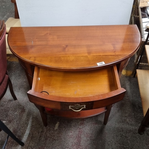 Halfmoon console table in polished mahogany with a single drawer
