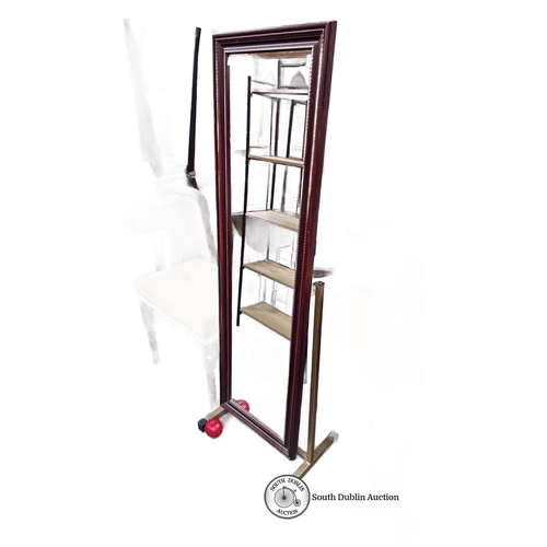 750 - Standing mirror with an ornately carved wooden frame, approximately 150cm high and 50cm wide, featur... 