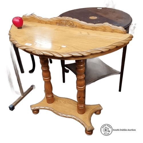 751 - Half-moon wooden side table with turned legs and carved details. Approximately 30