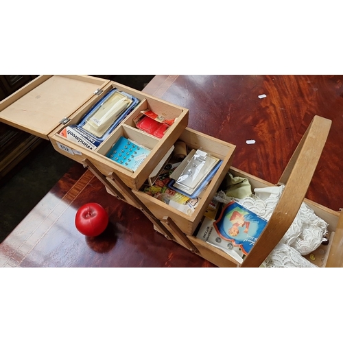 755 - Vintage wooden sewing box with contents, such as threads and lace. Approximately 20