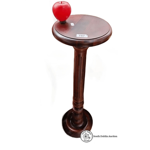 757 - Mahogany pedestal plant stand , approximately 30 inches tall, featuring a round top with a turned co... 