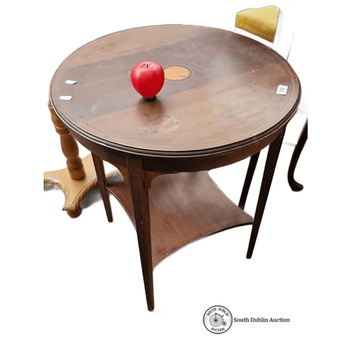758 - Round wooden side table with inlay detail. Approximately 70 cm height, 60 cm diameter.