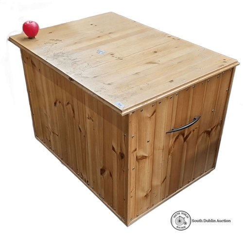 764 - A large Pine storage chest, approximately 100cm (L) x 60cm (W) x 70cm (H), with hinged lid and metal... 
