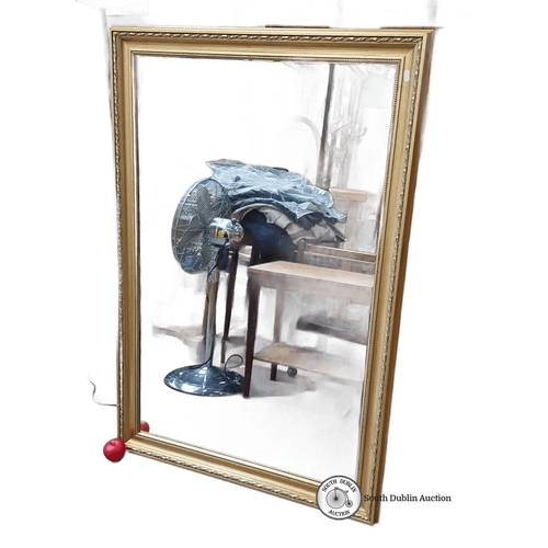 765 - Large vintage gilded mirror with ornate carved wood frame. Approximately 150 cm x 100 cm. Intricate ... 