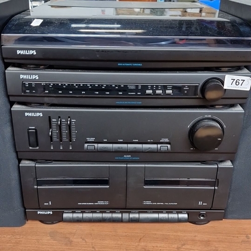 767 - Philips stereo system with dual cassette decks, semi-automatic turntable, and AM/FM analog stereo tu... 