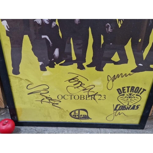 826 - Framed large poster of The Pogues, featuring printed band signatures. Approximately 24 x 36 inches.