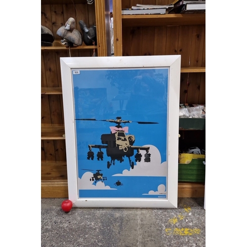 832 - A large print of a Banksy graffiti stencil painting titled 