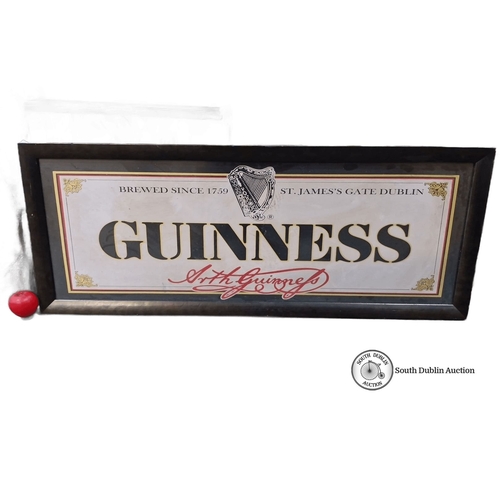 833 - A large Guinness advertising poster featuring the iconic harp logo and 'Brewed Since 1759'. Housed i... 