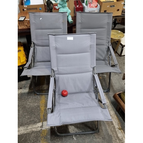 888 - Set of three Livarno folding chairs, light grey polyester fabric. Approximately 100 cm high.