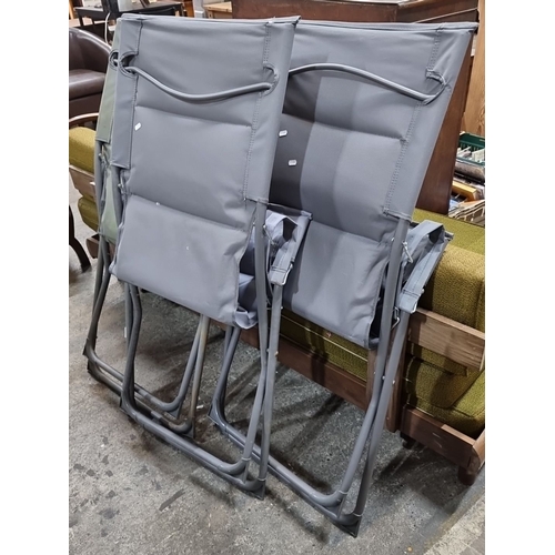 888 - Set of three Livarno folding chairs, light grey polyester fabric. Approximately 100 cm high.