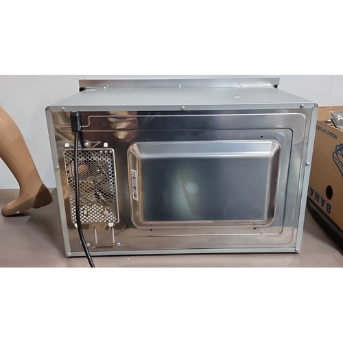 889 - Stainless steel Neff microwave oven with digital controls and a glass turntable. Model unspecified.