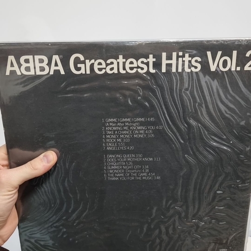 890 - Collection of vintage vinyl records, featuring ABBA Greatest Hits Vol. 2 and an assortment of classi... 