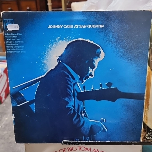 894 - Collection of vinyl records featuring iconic artists such as Johnny Cash, including 