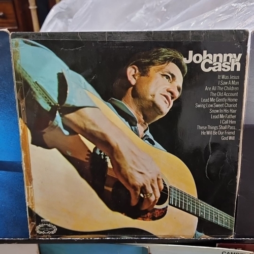 894 - Collection of vinyl records featuring iconic artists such as Johnny Cash, including 