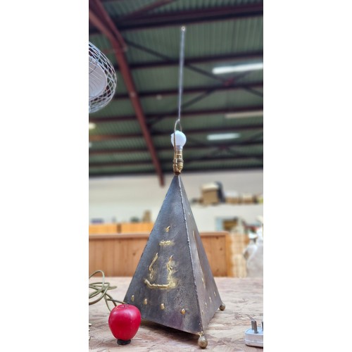 368 - A very unusual brass table lamp featuring a triangular pyramid form with abstract gilt design. Lovel... 