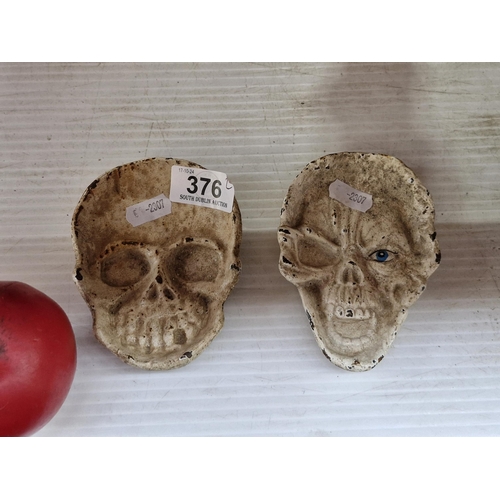 376 - Two cast metal Coin / Candy Dish Tray. Features Skull faces. Perfect for Halloween.