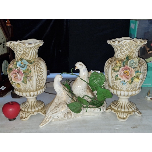 400 - Three vintage ceramic pieces including a pair of Capodimonte Italian vases in the baroque style with... 