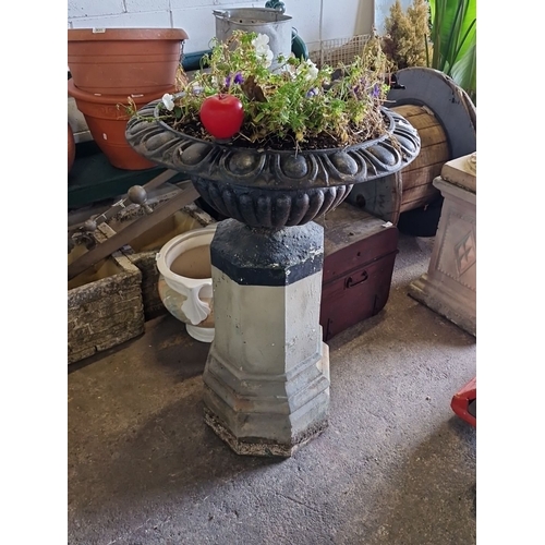 1071 - Star lot :Antique cast iron garden urn planter on a stone pedestal base. Approximately 36 inches tal... 