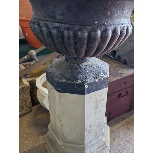 1071 - Star lot :Antique cast iron garden urn planter on a stone pedestal base. Approximately 36 inches tal... 