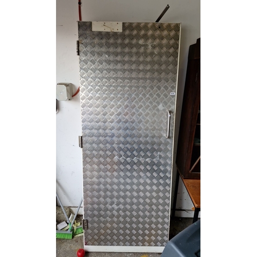 1076 - Star lot : Two Steel checkered security door with sturdy handle and hinges. Approximately 210 cm hig... 