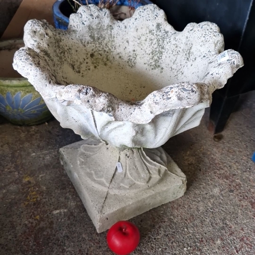 1081 - A handsome reconstituted stone garden pedestal planter with scalloped edge. Approximately 20 inches ... 