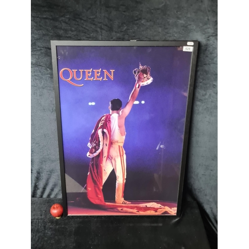 625 - A large print of a Freddie Mercury from Queen poster. Housed in a black frame behind glass.
From the... 