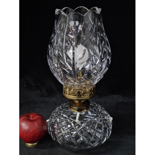 1002 - Star lot : A beautiful waterford crystal hurricane lamp. In super condition with etched branding.