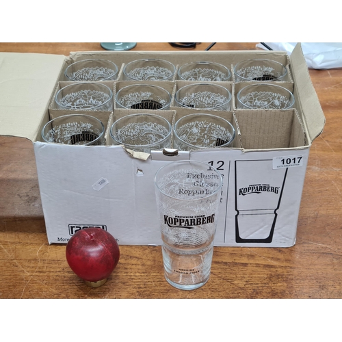 1017 - A brand new box of twelve Kopparberg Cider pint glasses.