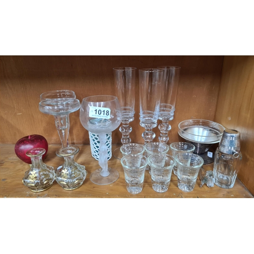 1018 - A nice selection of vintage glassware including a pair of bud vases, six shot glasses and an unusual... 