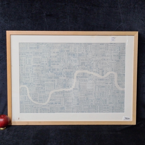 1020 - A framed word collage print outlining the iconic streets and boroughs of London, housed in smart pin... 