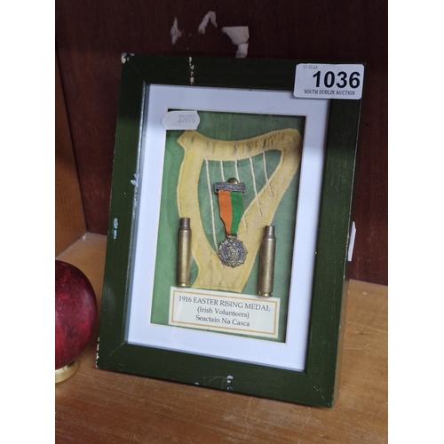 1036 - A framed commemorative piece of 