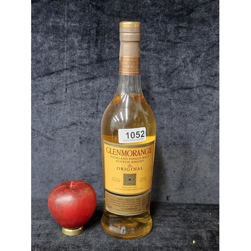 1052 - A sealed 70cl bottle of Glenmoragie 10 year old highland single malt scotch whisky the original. RRP... 