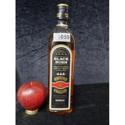 1059 - A sealed 700ml bottle of 160S Black Bush Bushmills Irish Whiskey.