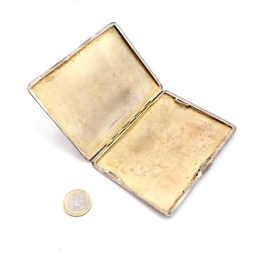 459 - A vintage mid-century sterling silver cigarette case with a silver gilt interior. Hallmarks for Birm... 