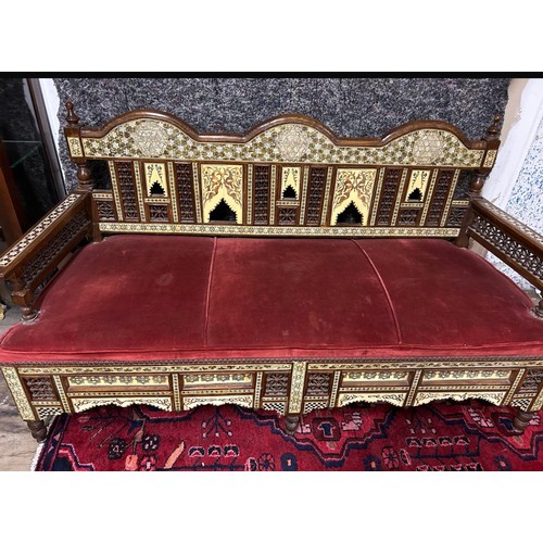 1194 - Star Lot : A fabulous Middle Eastern three seater couch , With A huge amount of inlay and carved bac... 