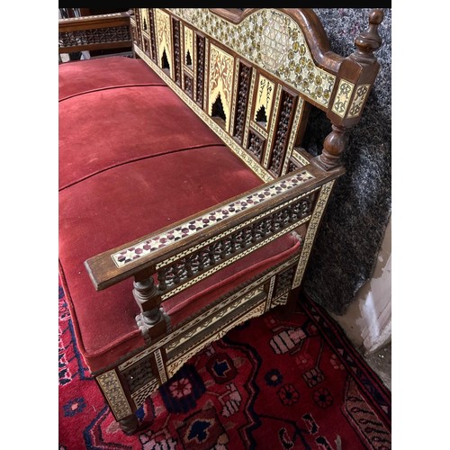 1194 - Star Lot : A fabulous Middle Eastern three seater couch , With A huge amount of inlay and carved bac... 