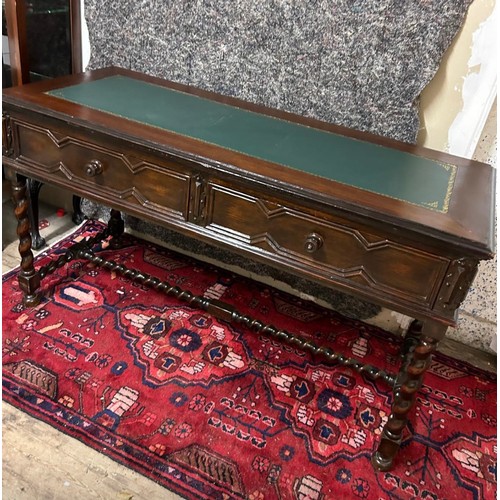 1224 - Star lot : A very handsome mahogany desk with a green tooled leather top. two drawers and a barley t... 