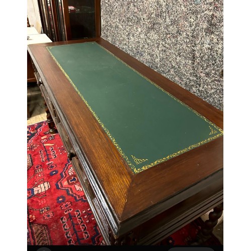 1224 - Star lot : A very handsome mahogany desk with a green tooled leather top. two drawers and a barley t... 