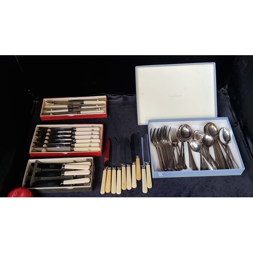 1092 - Newbridge cutlery set, featuring stainless steel knives with cream handles, and a boxed silver-plate... 