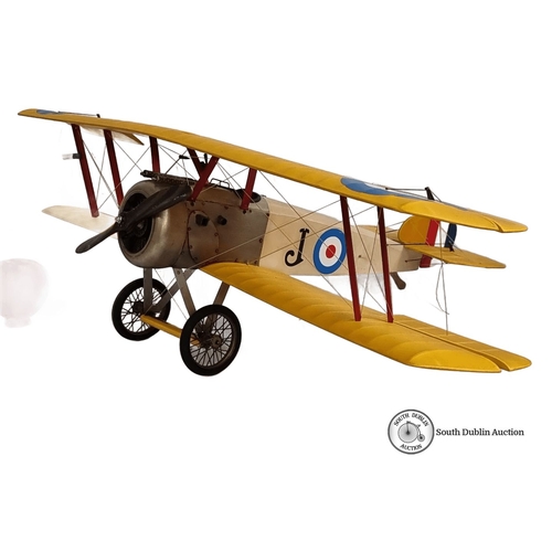 1099 - A large Vintage model biplane with yellow wings, replicating a World War I military aircraft. Featur... 