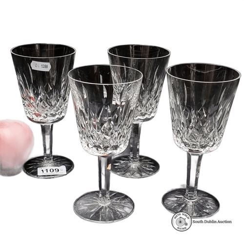 1109 - Set of four Waterford crystal wine glasses, featuring a classic cut pattern. Approximately 7 inches ... 