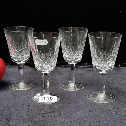 1110 - Set of four Waterford Crystal wine glasses with elegant cut pattern. Approximately 6 inches tall.